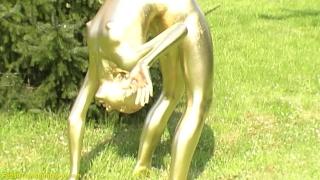 VoyeurHit Real Flexible Contortionist Gets Golden Painted Bj