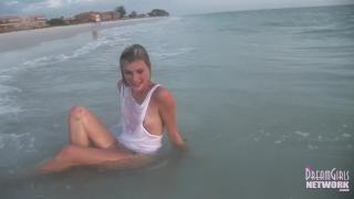 Body Massage Wet T-shirt Model Rolls around in the Water at Sunset Hetero