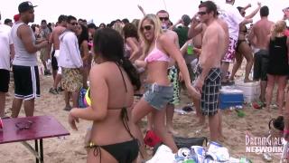 Gozo Bikini Clad Coeds with Big Ole Titties Dance on the Beach Fucks