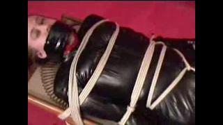 Free 18 Year Old Porn JADE TAPE GAGGED & BOUND TO COFFEE TABLE IN BLACK PVC CATSUIT & HIGH HEELED BOOTS Foreplay