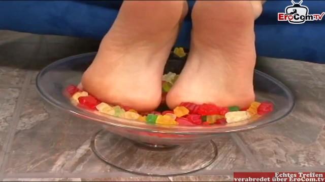 Skinny Brunette Slut Gets a Cumshot on her Feet and Play with Food - 1
