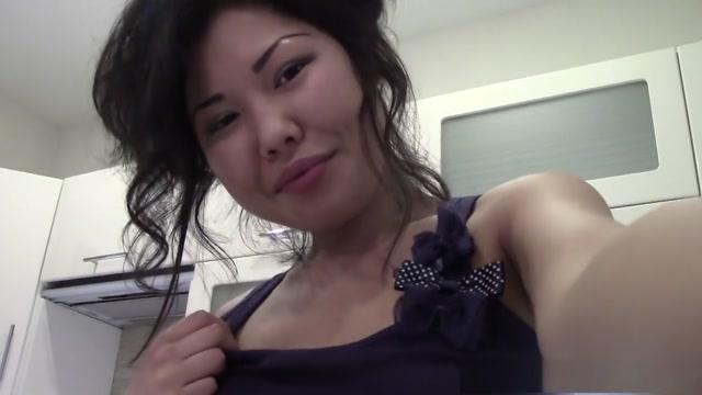 Slim arousing Chinese girl gets naughty in kitchen - 2