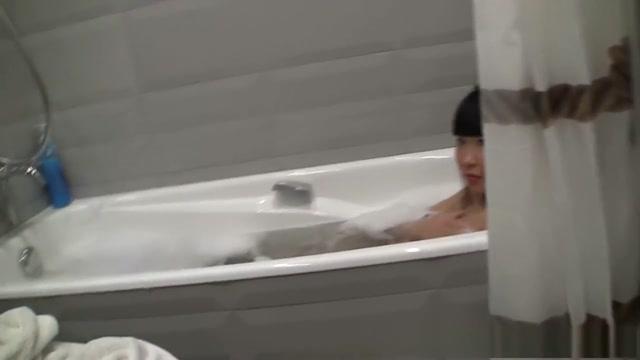 Sweet brunette is sucking dick in the bath tub - 1