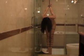 Khmer After a hogtie an Asian gal relaxes and is used up in the shower YouFuckTube