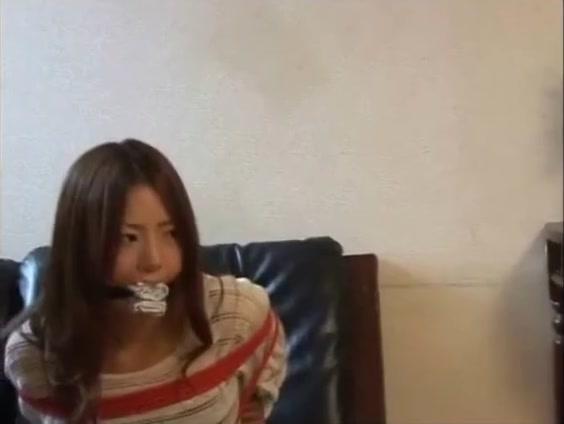 Gagged and tied Japan girl talks into phone - 2