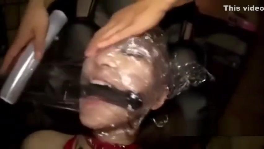 Japanese slut face covered in plastic food warp - 1