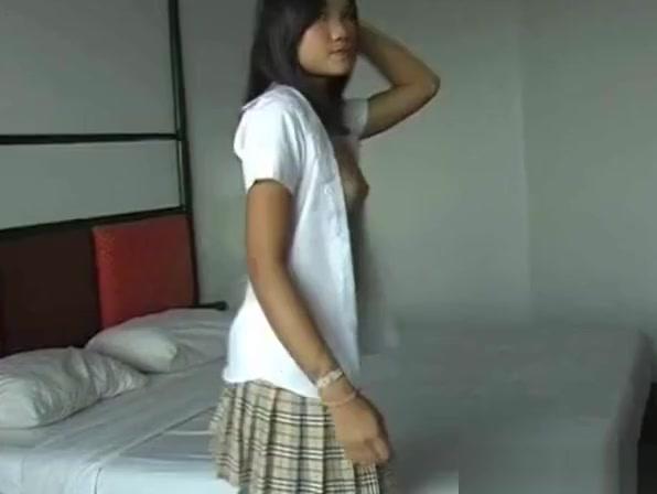 Cute Asian teen strips to reveal her perky little titties - 2