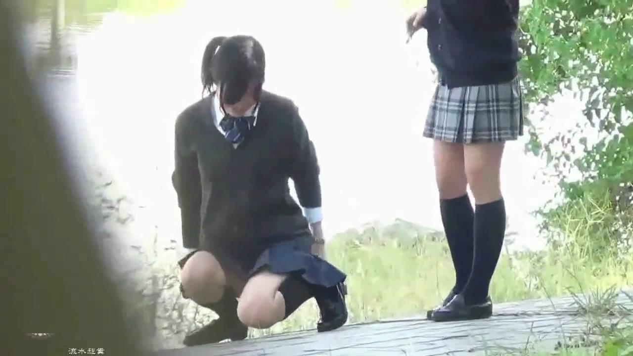3 Japanese schoolgirls pee together outside - 2