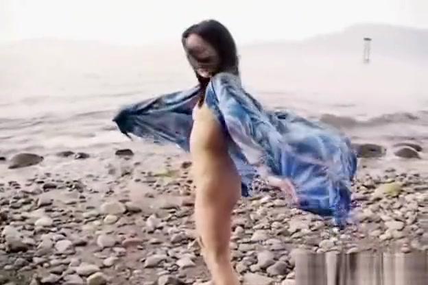 Face Fucking Asian slut is on the beach naked posing Celebrities