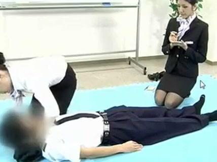 Japanese Stewardess Demonstrates Proper CPR Procedures - 1