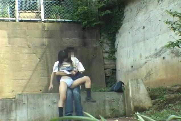 TubeWolf  Asian sweetie and her guy having sex on the steps outside Publico - 1