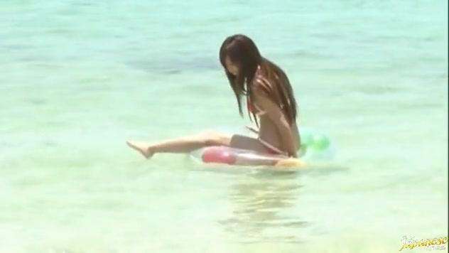 Rio Fujisaki Lovely Asian teen gives a hot blowjob on the beach - 2