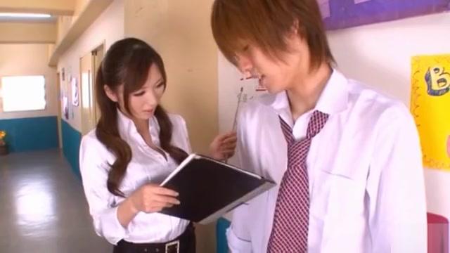 Hot and sexy Japanese porn star student Saki Ayano sucking and stroking a hard cock - 1