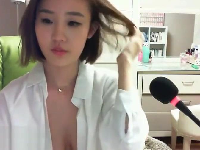 Busty Korean shows her incredible big tits - 1