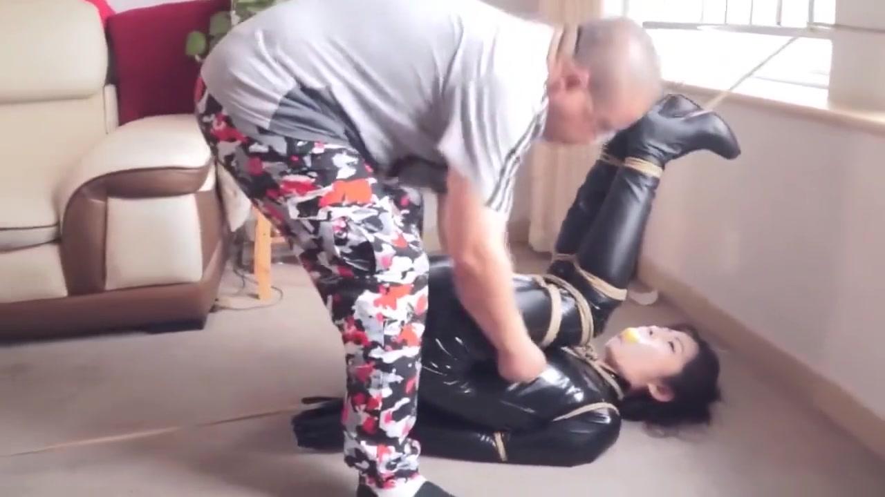 chinese CLEAR TAPE OVER BALL GAGGED IN CATSUIT - 1