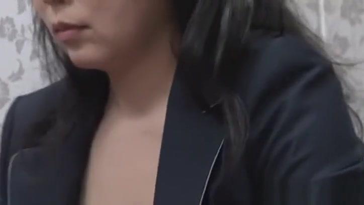 Naughty Asian mature lady in an office suit jerks off a co worker - 2